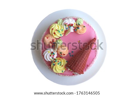 round cake on a plate on a white background