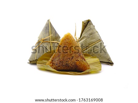 Sticky rice dumpling or Zongzi (Pyramid-shaped dumpling made by wrapping glutinous rice in bamboo leaves) for Chinese Boat dragon festival (5th Lunar month, Duanwu festival). Isolated on white