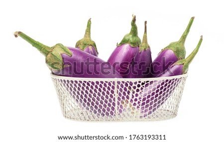 basket of eggplant isolated on white background