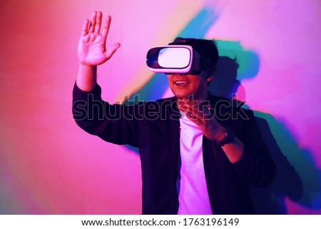 A man with glasses of virtual reality.