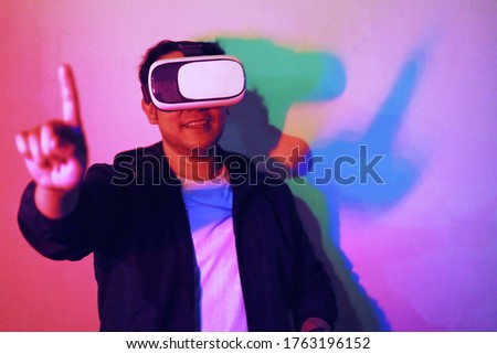 A man with glasses of virtual reality.