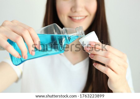 young girl uses mouthwash at home
 Royalty-Free Stock Photo #1763223899