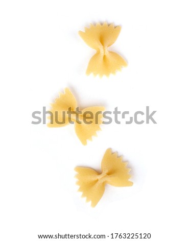 bow shaped pasta on white background Royalty-Free Stock Photo #1763225120