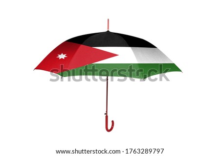 Umbrella with flag of Jordan isolated on white background.