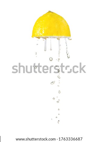 Squeeze lemon isolated on white Royalty-Free Stock Photo #1763336687