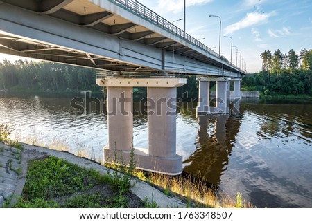 car bridge across the wide river