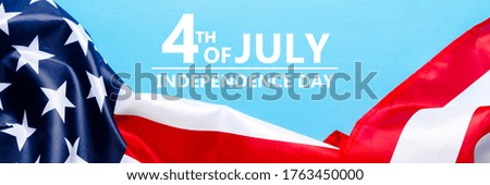 USA flag on a blue background. United States. Concept Memorial Day, Independence Day, July 4th. Banner. Flat lay, top view