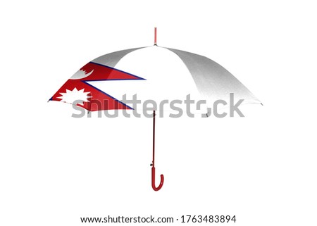 Umbrella with flag of Nepal isolated on white background.
