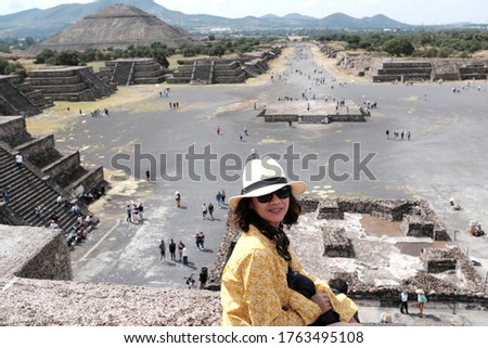View from the Pyramid of the Moon overlooking the Avenue of the Dead and Pyramid of the sun in the background in Teotihuacán Municipality.