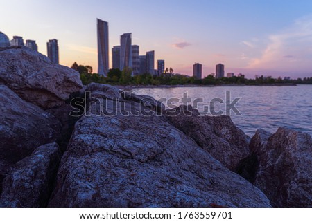 Blurred view of Modern skyscrapers in Etobicoke on a summer sunset