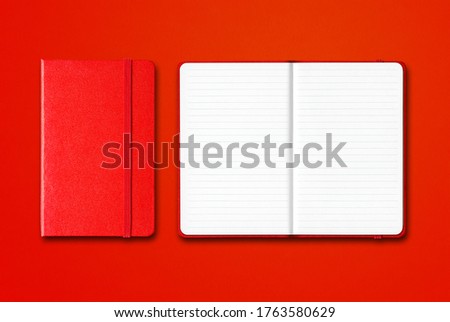 Red closed and open lined notebooks mockup isolated on colorful background