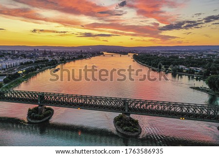 Aerial picture of main river mouth and the city of Mainz during sunset in afterglow