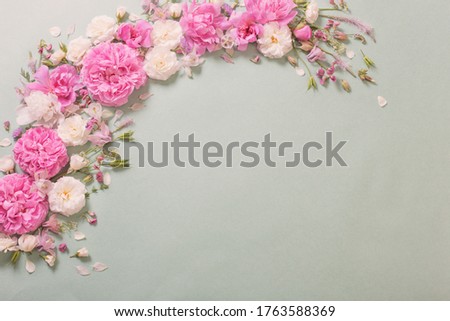 pink and white roses on paper background