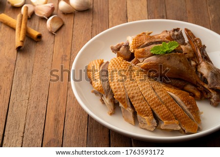 Chinese stewed duck in the white plate