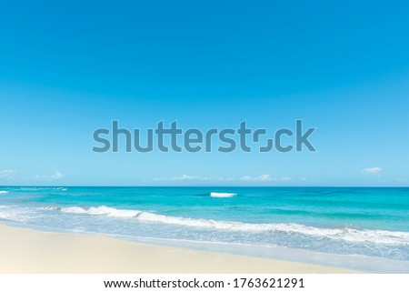 Turquoise seawater and blue sky and white sand beach and wave background. Without people copy space
