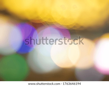 The picture of Yellow abstract background blur with bokeh lights
