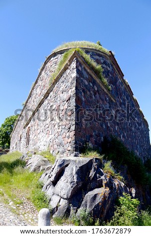 The walls of the old fortress, forming an acute angle. Sveaborg, Helsinki, Finland Royalty-Free Stock Photo #1763672879
