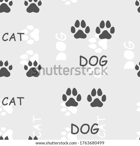  animal tracks.  title.cat, dog. seamless pattern. vector.