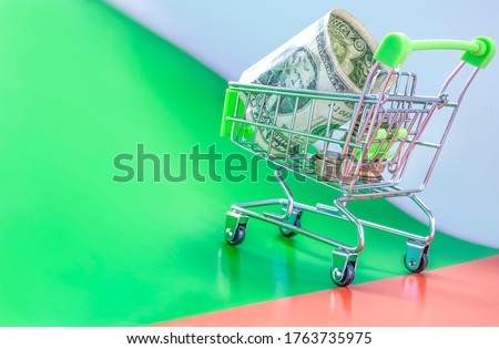 trolley concept with a bill. business rises uphill