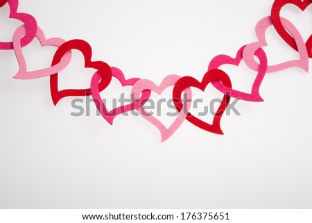 Heart shape hanging decoration on a white background