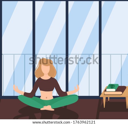 Yoga, relax and chill. girl sitting in lotus position against the background of 
panoramic windows. padmasana pose. woman meditating in apartment. 
