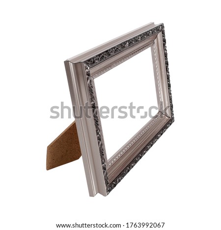 Silver frame for paintings, mirrors or photo in perspective view. Design element with clipping path
