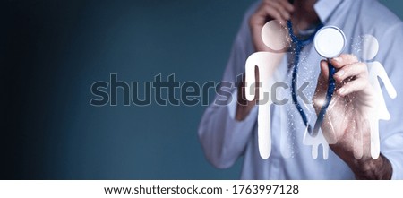 Doctor holds a stethoscope in his hand. People health insurance concept.
