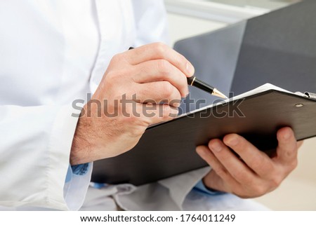 Hygiene inspector when working with clipboard Royalty-Free Stock Photo #1764011249