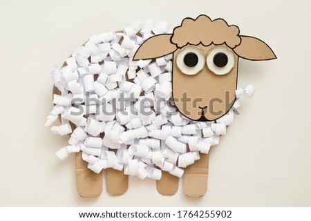 Paper sheep. DIY toy for early.