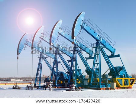 Oil pumps. Oil industry equipment.  Royalty-Free Stock Photo #176429420