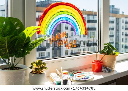 Rainbow on window during quarantine at home.