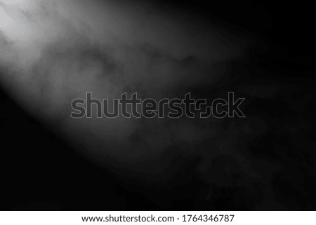 Soft light and fog on black background