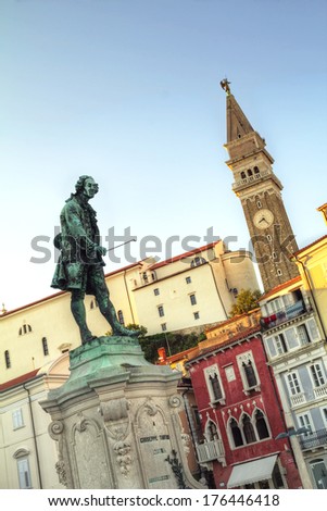Old town Piran with statue of Giuseppe Tartini Royalty-Free Stock Photo #176446418