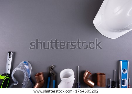 Happy Labor day,  Construction tools on a dark background. Labor day  concept. Copy space text