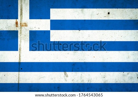 Flag of Greece on a concrete wall. Travels. Flags