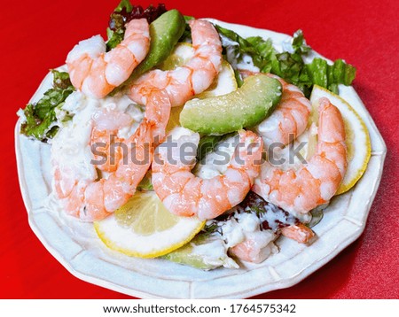 This is a picture of avocado and shrimp salad.