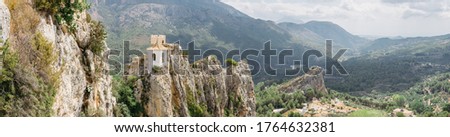 Guadalest, Alicante, Spain. Panorama of the mountain ranges, the Guadalest Valley and the Guadalest Castle.