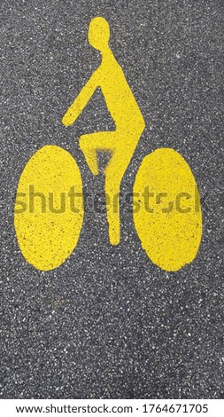 road and traffic symbol of bicycle lane in road in France