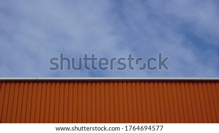 roof warehouse building against sky background