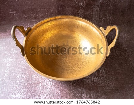 brass wok, Thai traditional cookware, used for cooking desserts or fruit preserves  Royalty-Free Stock Photo #1764765842