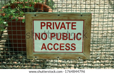                 Sign no public access in the park.          