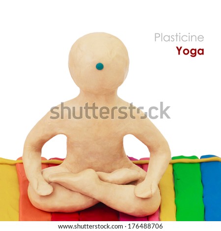 Plasticine man sitting in maditation yoga lotus posture on white background