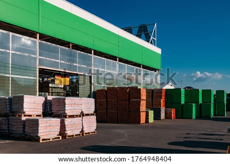 Stack of construction materials in the warehouse