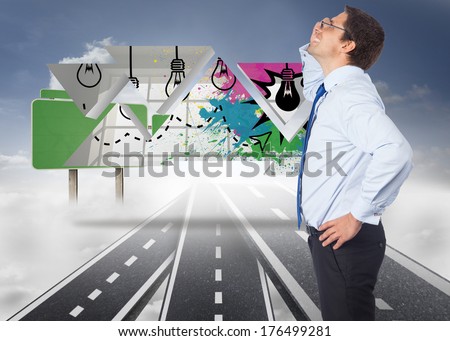 Thinking businessman tilting glasses against roads over clouds with empty signposts