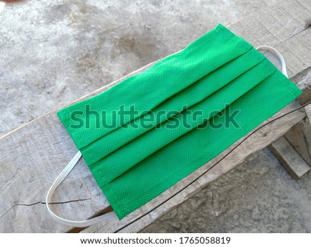 green mask of health protective equipment