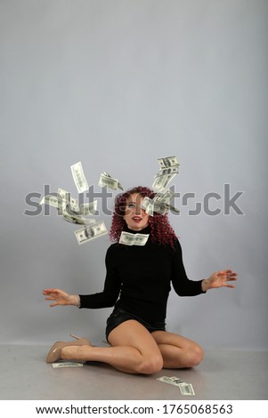curly girl throwing up money