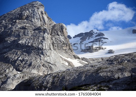 the snow melts in summer on the Marmolada glacier, Italy