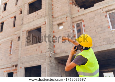 Construction Worker doing bad signal
