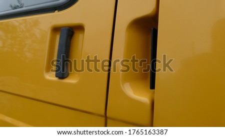 Passenger door handle of a minibus 