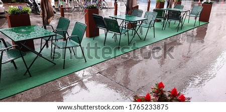 Large-size pictures of restaraunt interior on a rainy morning in summer in a City of Vienna